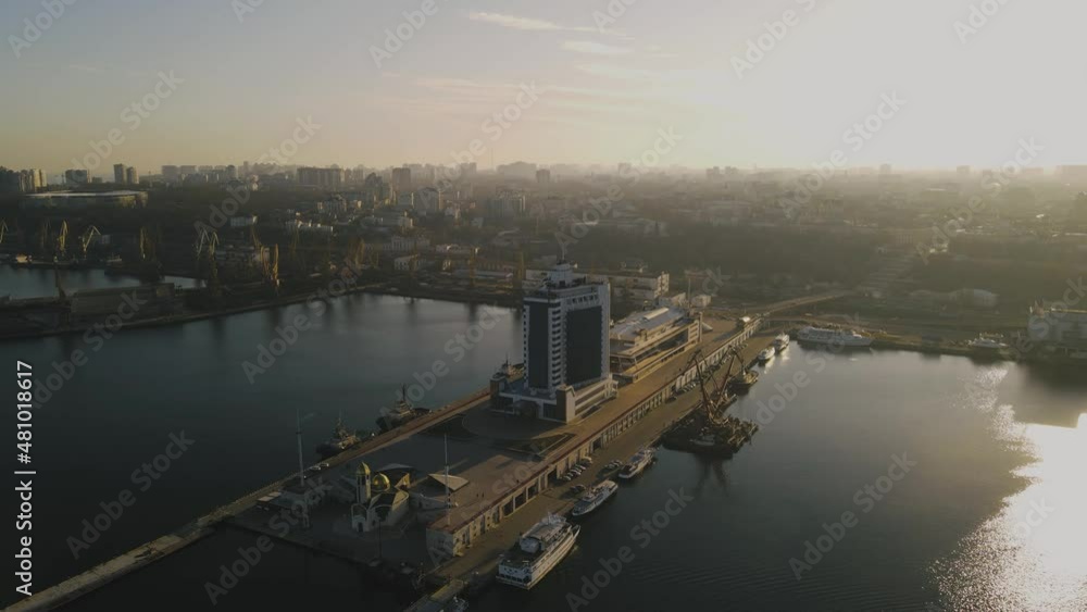 Odessa port view from drone. Aerial view of a large commercial port of international importance on the northwestern coast of the Black Sea. Major port of Ukraine in terms of cargo turnover. Odessa port view from drone. Aerial view of a large commercial port of international importance on the northwestern coast of the Black Sea. Major port of Ukraine in terms of cargo turnover.