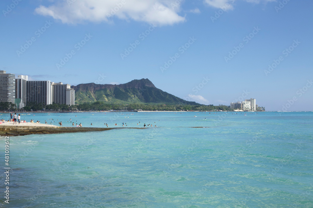 People in Waikiki with Diamond Head in Distance, O'ahu, HI,