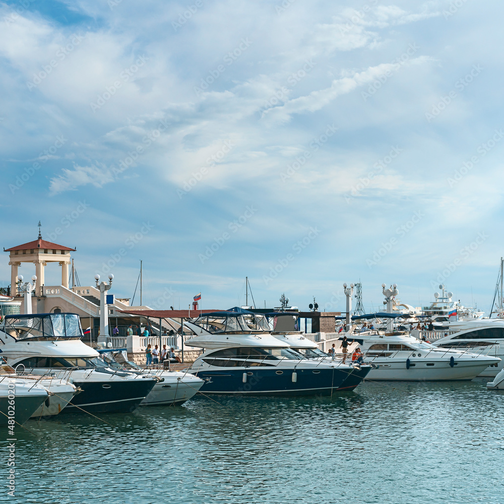 Fototapeta premium luxury private yachts moored at the pier of the seaport of Sochi, Russia