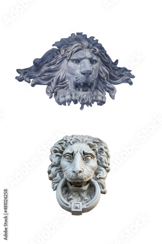 two plaster sculpture lion heads isolated on white background