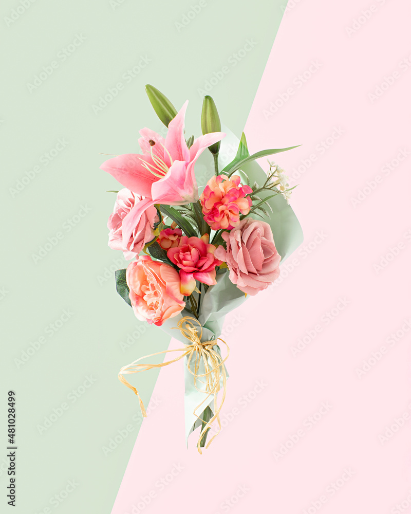 A Valentine or Wedding bouquet of fresh Spring pink and white flowers. Creative pastel colored concept.