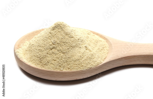 Ashwagandha powder in wooden spoon (Withania somnifera) isolated on white