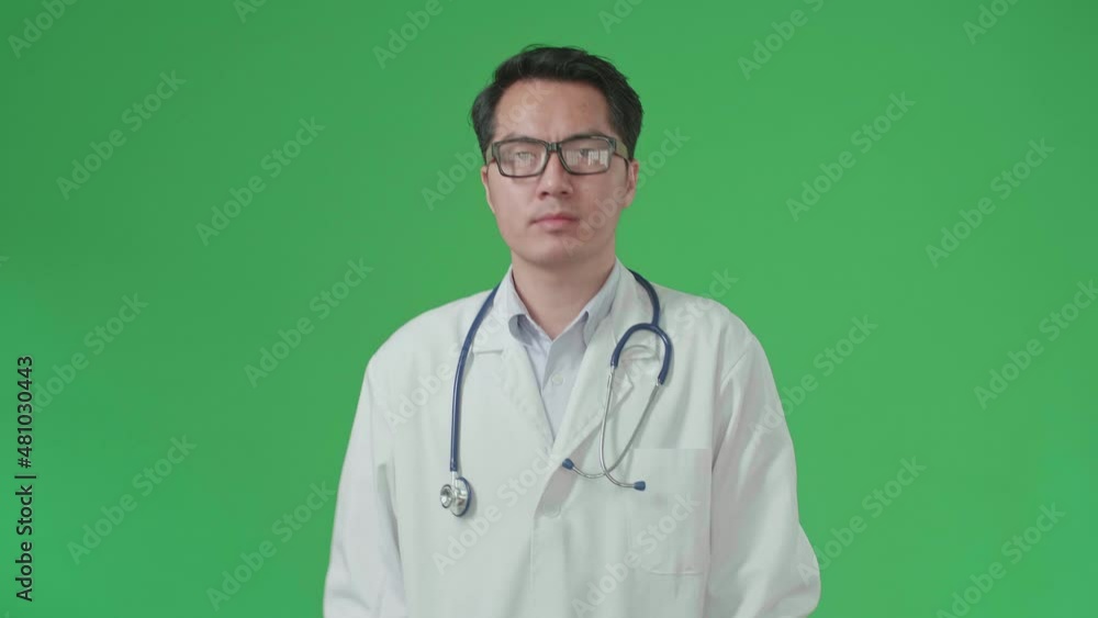 The Front View Of Asian Doctor With Stethoscope Wearing Glasses And White Coat Walking On Green Screen Chroma Key.
The Front View Of Asian Doctor With Stethoscope Wearing Glasses And White Coat Walking On Green Screen Chroma Key.