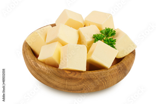 butter cubes in wooden bowl isolated on white background with clipping path and full depth of field