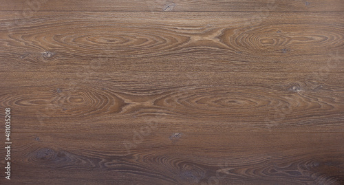 Laminate wood floor background texture. Wooden laminate floor and corkboard with
