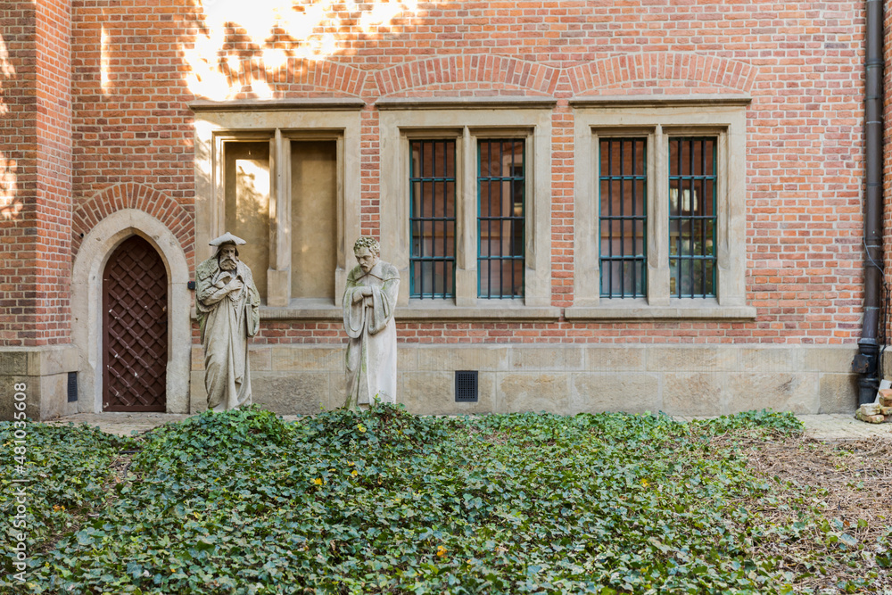 Stone figures in the university courtyard in Krakow.
