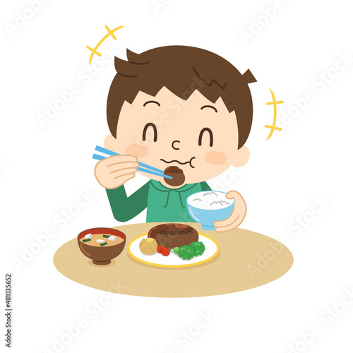 笑顔で食事をする男の子 ハンバーグ