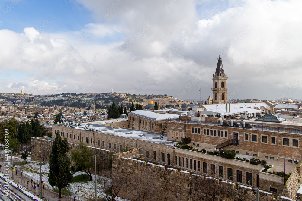 aerial view of old city of jerusalem with snow