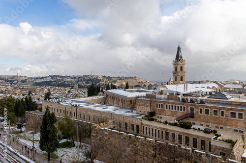 aerial view of old city of jerusalem with snow