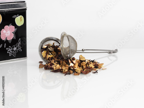 Wallpaper Mural Dry loose tea hibiscus on a white background Studio Photo, macro, many details, tea strainer, tea box in the background Torontodigital.ca