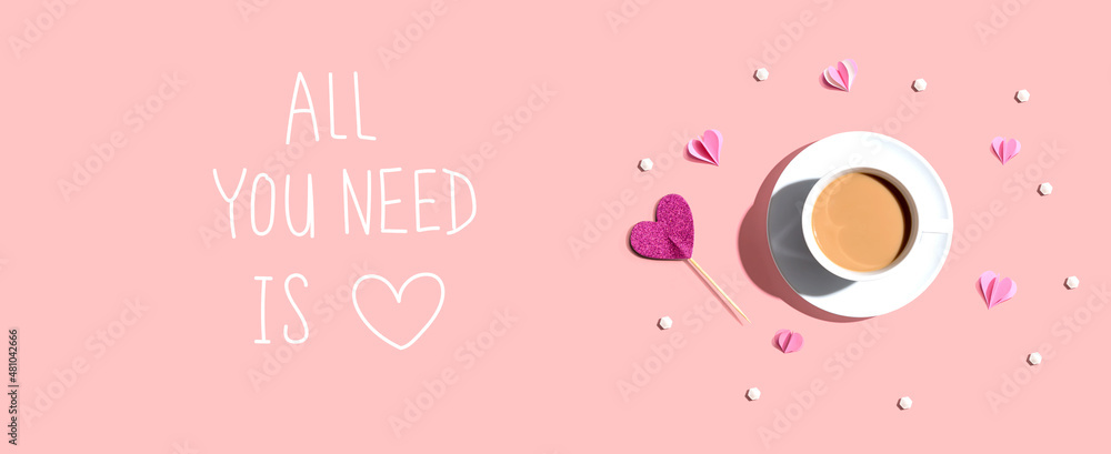 All you need is love message with a cup of coffee and paper hearts - flat lay - obrazy, fototapety, plakaty 