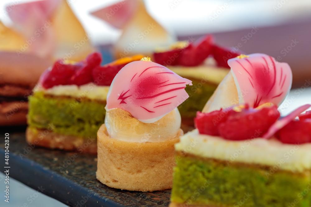 Ταπετσαρία Indulge in a Decadent Display of Sweets: A Delicious Dessert Tray Served at Your Next Catered Event