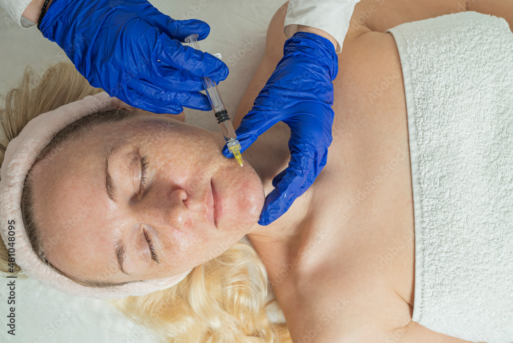 Anti-wrinkle surgery. An injection of the beauty of a young woman. Facial treatments. Anti-wrinkle surgery. An injection of the beauty of a young woman. Facial treatments.