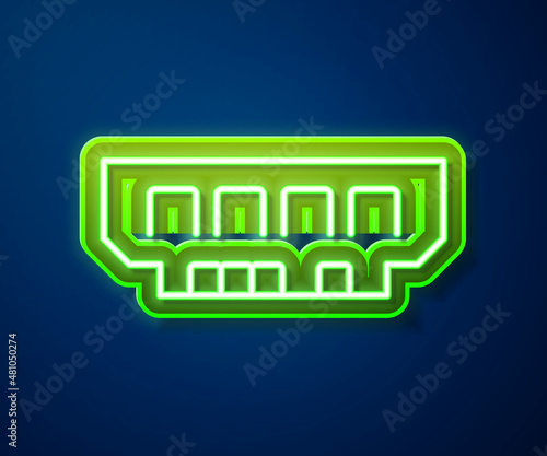 Glowing neon line RAM, random access memory icon isolated on blue background. Vector