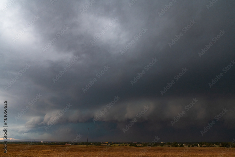 Supercell with shelf cloud rolls across the Wichita Mountains in Oklahoma 