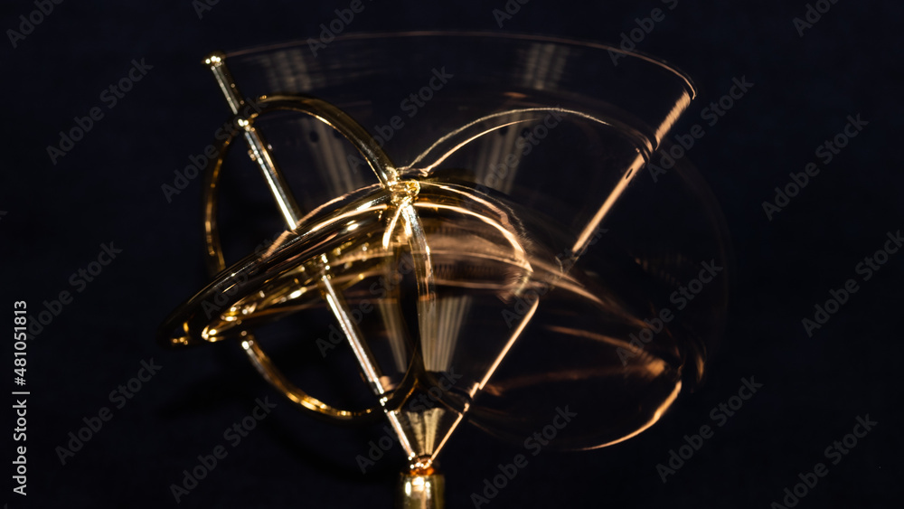 Golden Gyroscope Spinning on its Base Golden Gyroscope Spinning on its Base