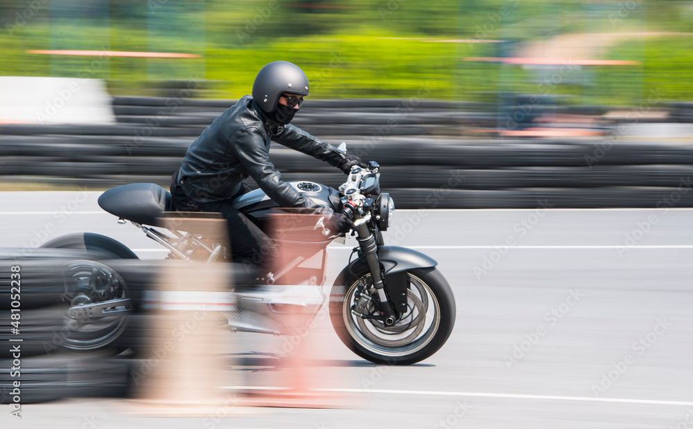 man rides his electric motorcycle on race track in Bangkok man rides his electric motorcycle on race track in Bangkok