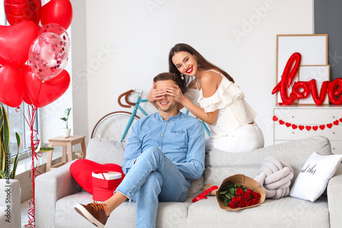 Young woman greeting her bo...