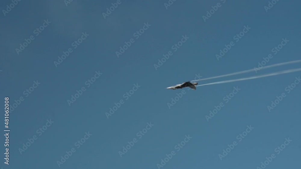 Saab JAS 39 Gripen Multirole Fighter Aircraft Of Swedish Air Force Demonstrating Spin And Turns During The Gdynia Aerobaltic 2021 Airshow. - tracking Saab JAS 39 Gripen Multirole Fighter Aircraft Of Swedish Air Force Demonstrating Spin And Turns During The Gdynia Aerobaltic 2021 Airshow. - tracking