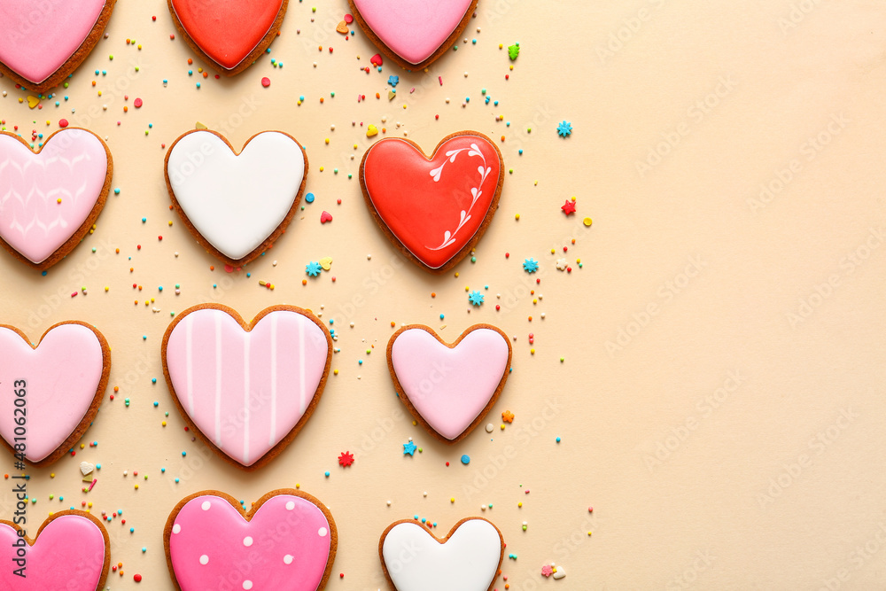 Tasty heart shaped cookies on beige background Tasty heart shaped cookies on beige background