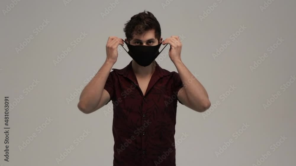 man in black shirt, wearing black masks against deadly virus contamination, photo taken in studio man in black shirt, wearing black masks against deadly virus contamination, photo taken in studio