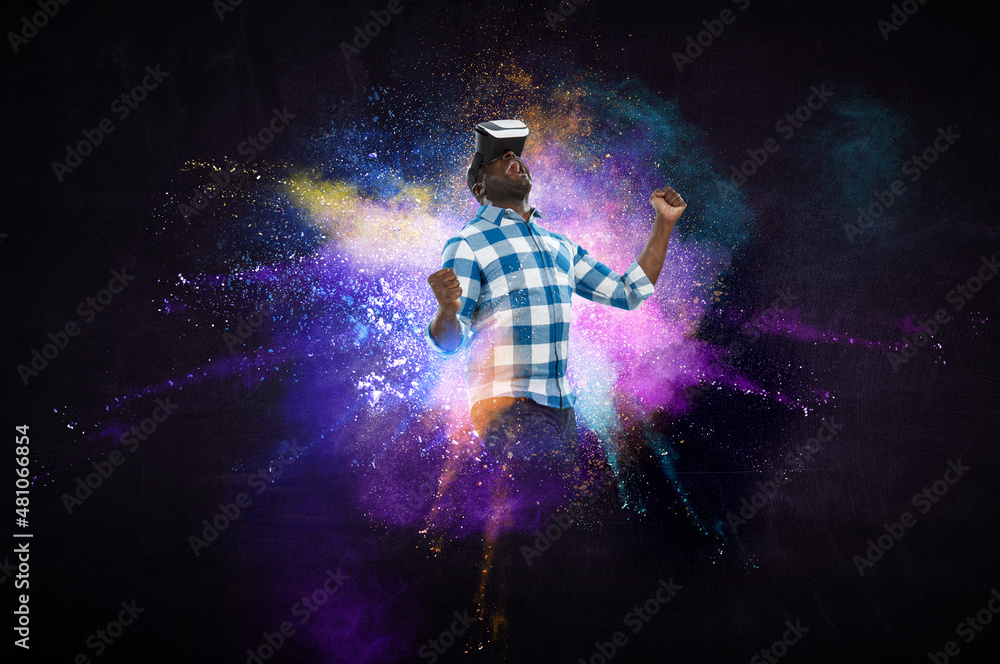 Fototapeta premium Man wearing virtual reality goggles