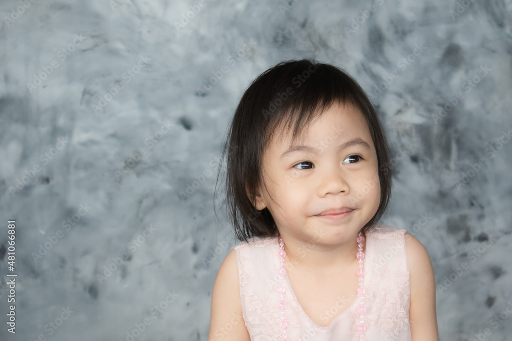 Asian girl with adorable short hair looking to the right. Asian girl with adorable short hair looking to the right.