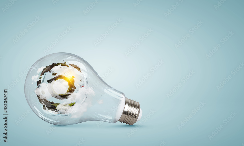 Green landscape inside light bulb Green landscape inside light bulb