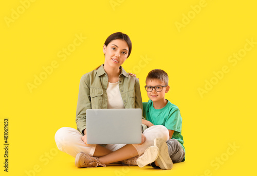 Little boy with his older s...