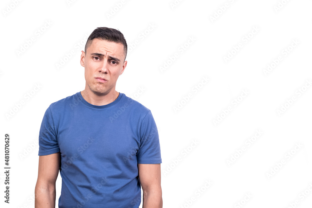 Man standing with sad expression Man standing with sad expression