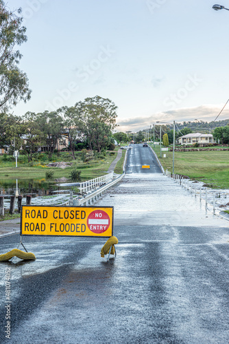 Australian country road flooded in 2021 Queensland Floods (ID: 481074052)