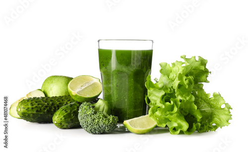 Glass of healthy green juice and fresh ingredients on white background