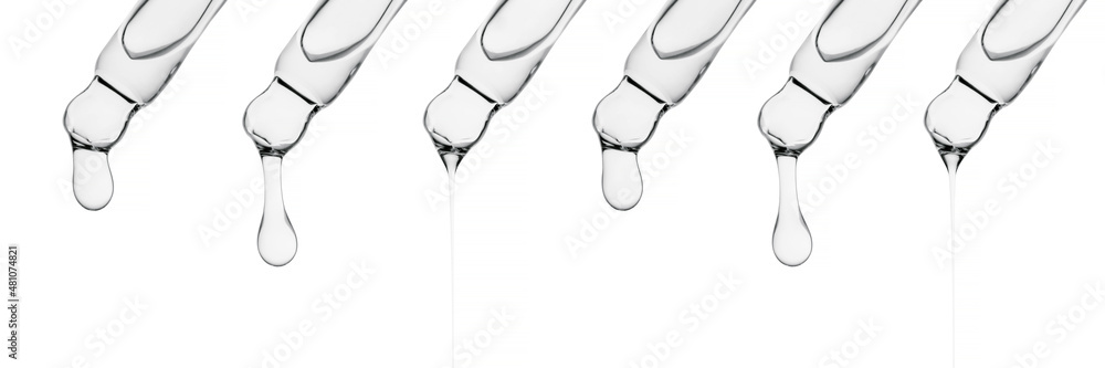 A banner with several pipettes with serum or other cosmetic product. A banner with several pipettes with serum or other cosmetic product.