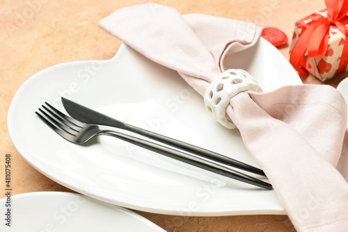 Beautiful table setting for Valentine s Day on beige background