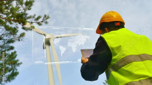 Wind energy engineer collecting usage data from a windmilll turbine - 3D HUD render photo