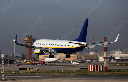 Airplane lands at the airport of Barcelona. Spain
