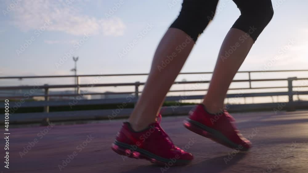 sport and active lifestyle, running woman in city, closeup of feet sport and active lifestyle, running woman in city, closeup of feet
