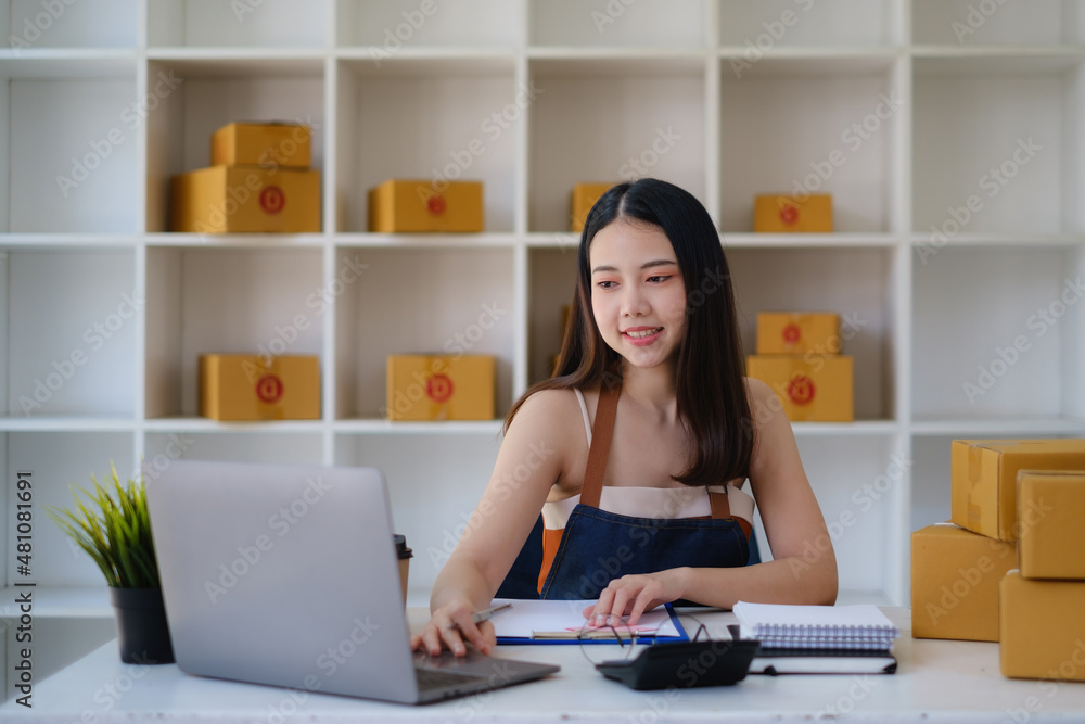 Asian small business owner working at home office. Business retail market and online sell marketing delivery, SME e-commerce concept. Asian small business owner working at home office. Business retail market and online sell marketing delivery, SME e-commerce concept.