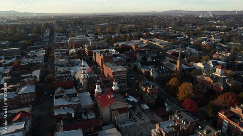 Downtown Frederick, Maryland USA. Drone Aerial View of Churches and Buildings on Sunny Autumn Morning photo