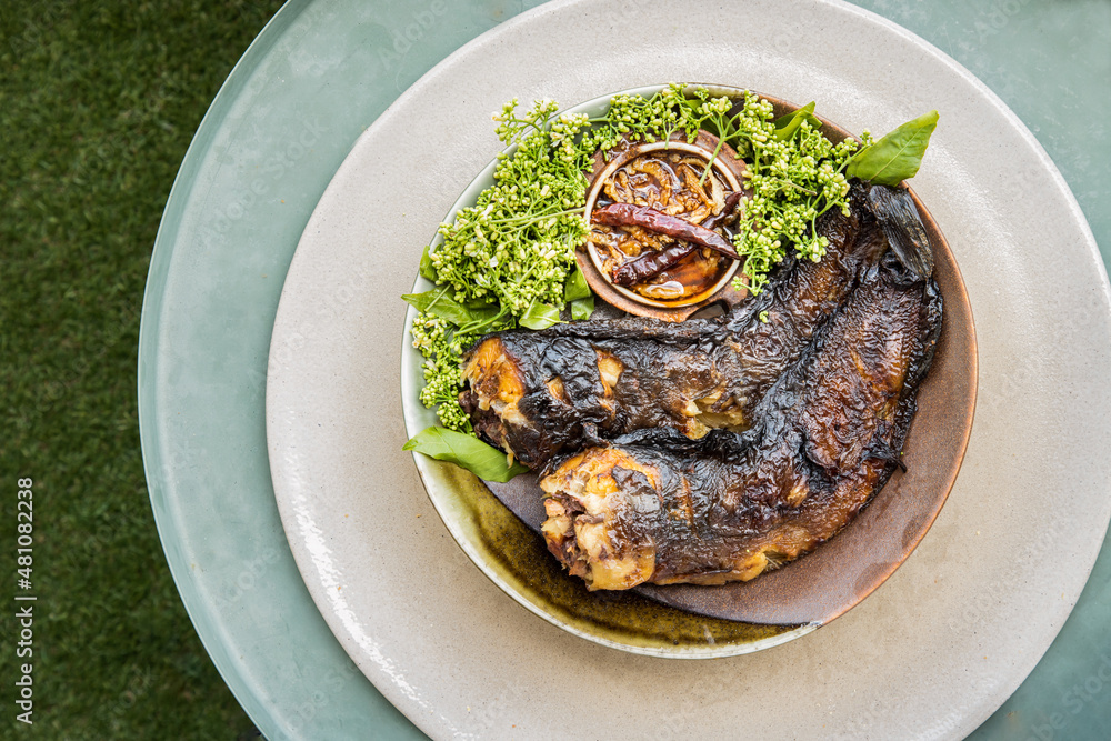 Pla Wan Fish Grilled catfish (Roasted Catfish) and neem leaf served with sweet ...