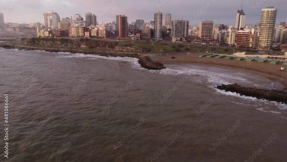 Mar del Plata promenade and beach at sunrise, Argentina. Aerial backward Mar del Plata promenade and beach at sunrise, Argentina. Aerial backward