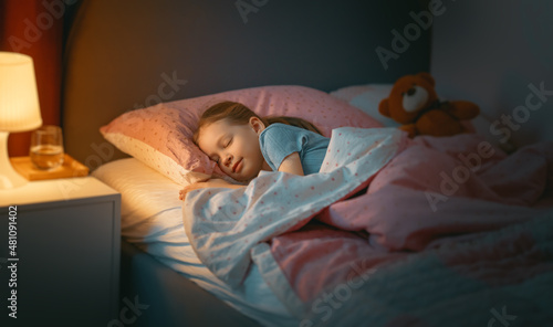 Canvas-taulu child is sleeping in the bed