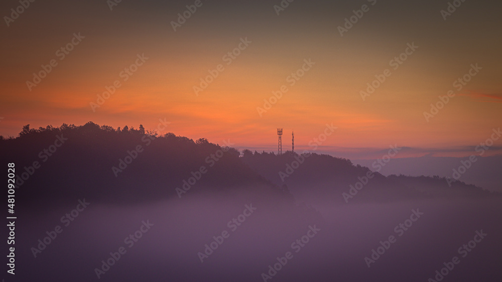 Landscape in the morning fog at dawn. sunrise. sun rays at dawn. Landscape in the morning fog at dawn. sunrise. sun rays at dawn.