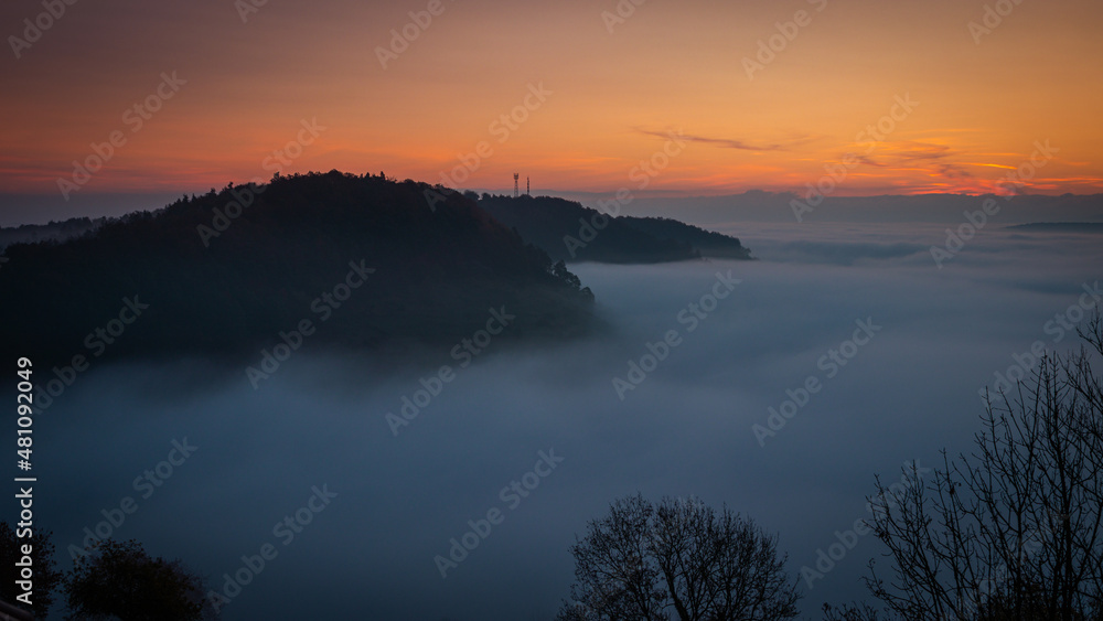 Landscape in the morning fog at dawn. sunrise. sun rays at dawn.