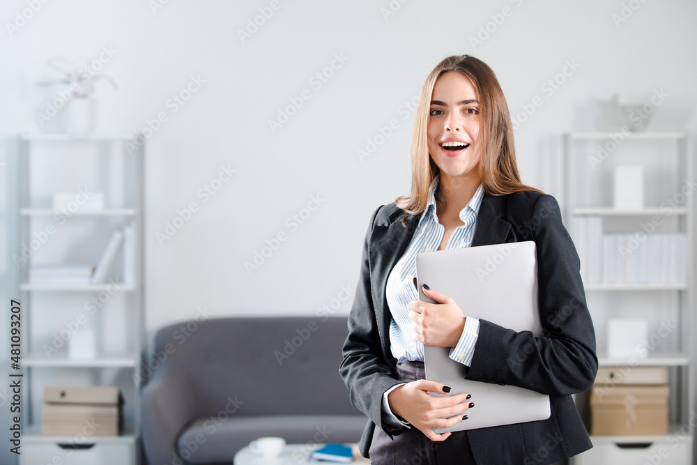 Portrait of young business woman freelancer or ceo employee working in office. Portrait of young business woman freelancer or ceo employee working in office.