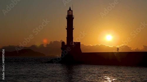 Magical sunset behind the lighthouse in Chania, Crete island, Greece