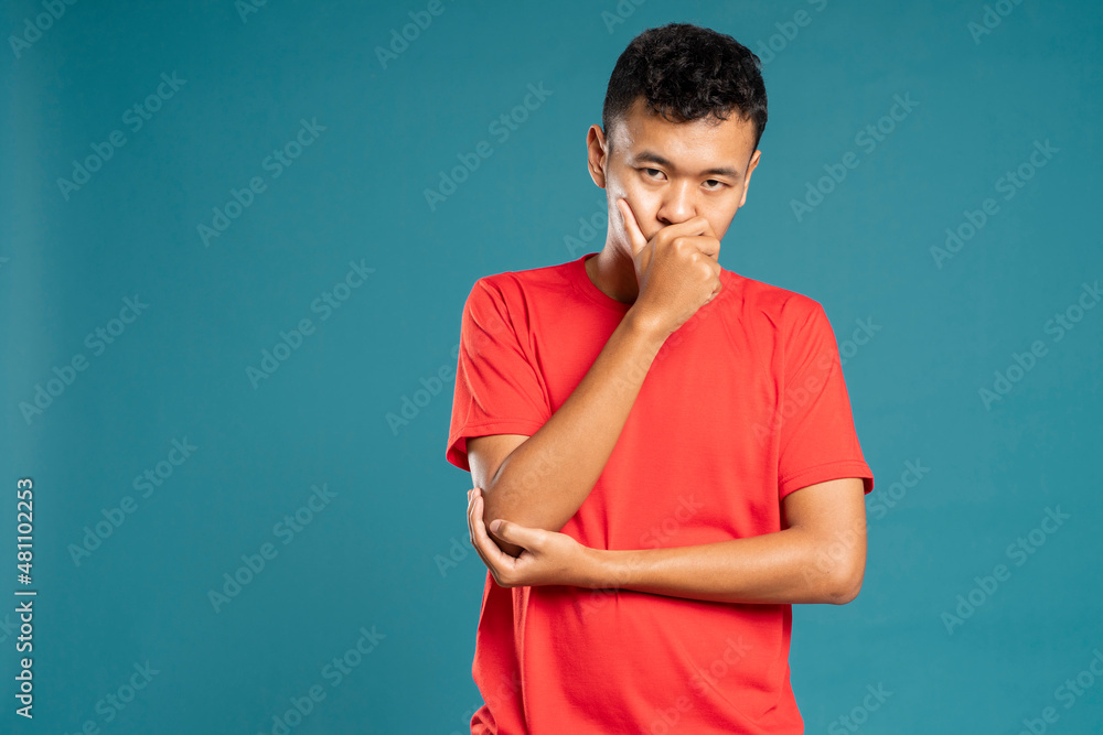 young cute man disposes of a problem serious face looking young cute man disposes of a problem serious face looking