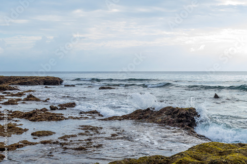 waves crashing on rocks © Sondipon