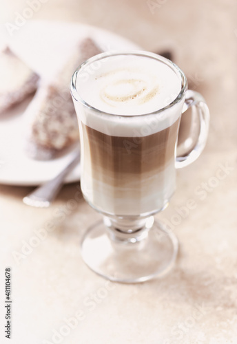 Fototapeta Naklejka Na Ścianę i Meble -  Coffee with milk on bright stone background. Soft focus. Close up.	