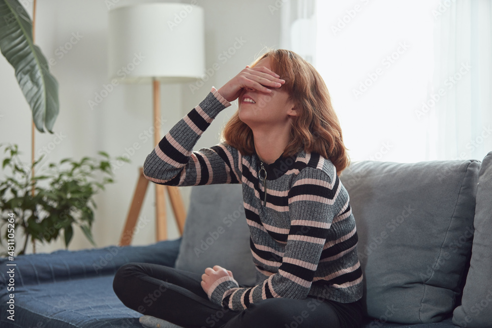 Obraz premium Teenage girl being bored and difficult at home.